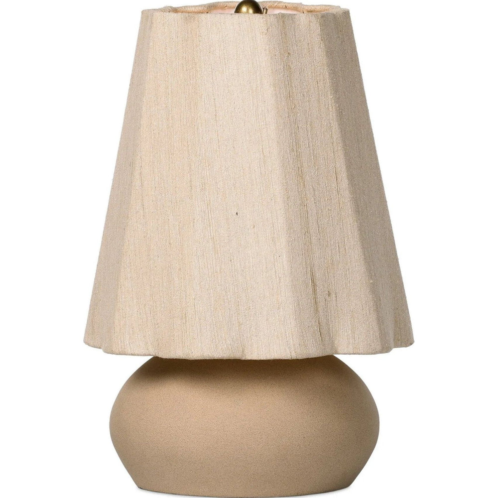 A large ceramic base with a speckled glossy finish supports a scalloped pure silk shade with fluid curves — a look that's instantly soft and bold Amethyst Home provides interior design, new home construction design consulting, vintage area rugs, and lighting in the Los Angeles metro area.