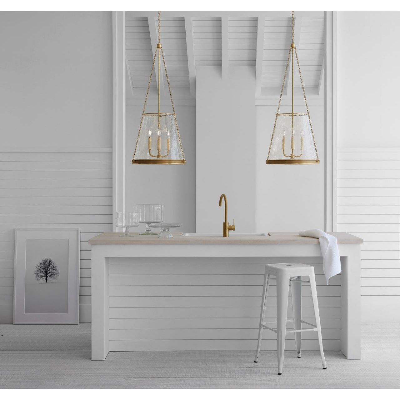 Featuring Reese 18" Pendant Soft Brass by Visual Comfort at Amethyst Home. The Reese by Marie Flanigan strikes an impressive silhouette with clean lines and vintage sophistication. Available as a globe pendant in restoration glass or a conical pendant in glass or linen, the design is supported by elegant metalwork in a variety of finishes. Singular or multiple pendants will cast warm. Amethyst Home provides interior design, new construction, custom furniture, and area rugs in the Boston metro area