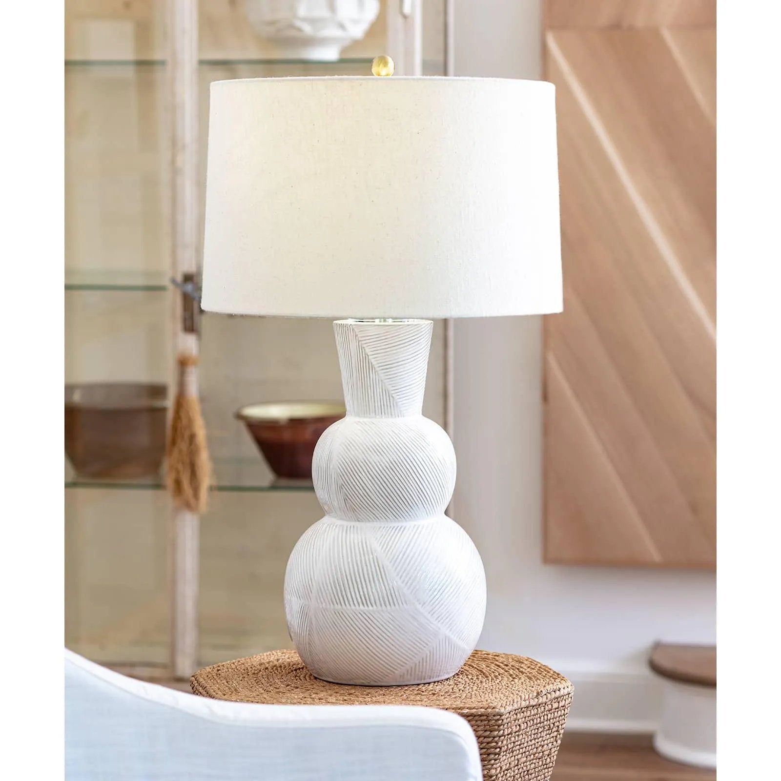 With its alluring silhouette, the Hugo ceramic table lamp brings contemporary appeal and modern contrast to interiors. Employing a specialized glazing technique, master artisans hand-shape earthenware to produce a luxurious finish for subtle highs and lows that shift with the light source above. Amethyst Home provides interior design, new home construction design consulting, vintage area rugs, and lighting in the Laguna Beach metro area.