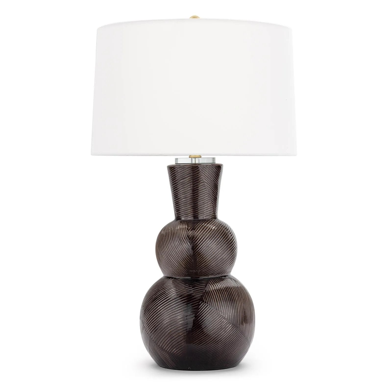 With its alluring silhouette, the Hugo ceramic table lamp brings contemporary appeal and modern contrast to interiors. Employing a specialized glazing technique, master artisans hand-shape earthenware to produce a luxurious finish for subtle highs and lows that shift with the light source above. Amethyst Home provides interior design, new home construction design consulting, vintage area rugs, and lighting in the Seattle metro area.