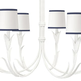 With its botanical influence and white finish, the River Reed Chandelier is the ideal fixture for any traditional living space. Six reeded arms reach upward toward navy shades, joined in the middle of the fixture with two detailed bands. This six-light fixture is suspended on an elegant chain, adorning a room with organic, natural glamour. Amethyst Home provides interior design, new home construction design consulting, vintage area rugs, and lighting in the Alpharetta metro area.