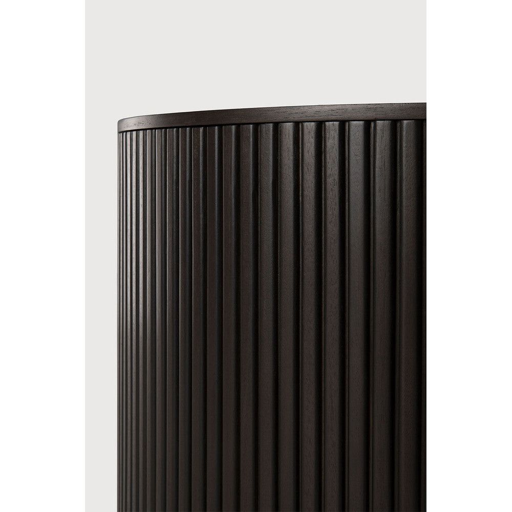 Designed by Jacques Deneef, the Roller Max is a clever multifunctional item that combines a coffee table with storage.  Encapsulated in its stacked wood-stick effect, the tabletop can be easily removed to hide the newspapers, toys, cushions and throws from daily life. The perfect solution for smaller living.

The tabletop can be removed to store objects inside the table. Amethyst Home provides interior design, new construction, custom furniture, and area rugs in the San Diego metro area