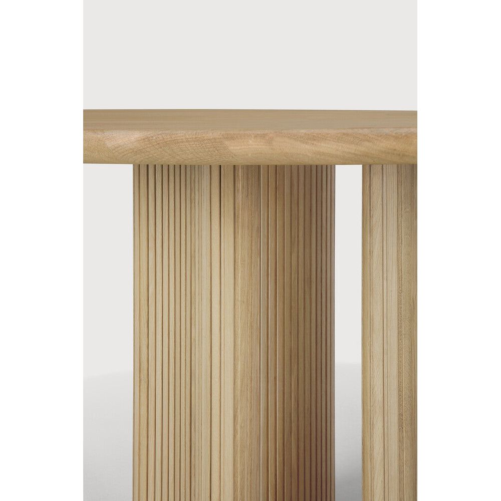 Featuring Roller Oak Round Max Dining Table by Ethnicraft at Amethyst Home. The Roller Max collection is remarkable in its design, distinguished with its stacked wood-stick effect. The dining table perfectly melds form with function. Featuring the option of reversable legs that can change the aesthetic to reflect personal style.Weight : 163 lbs Dimensions: 59.5" W x 59.5" L x 3. Amethyst Home provides interior design, new construction, custom furniture, and area rugs in the Laguna Beach metro area