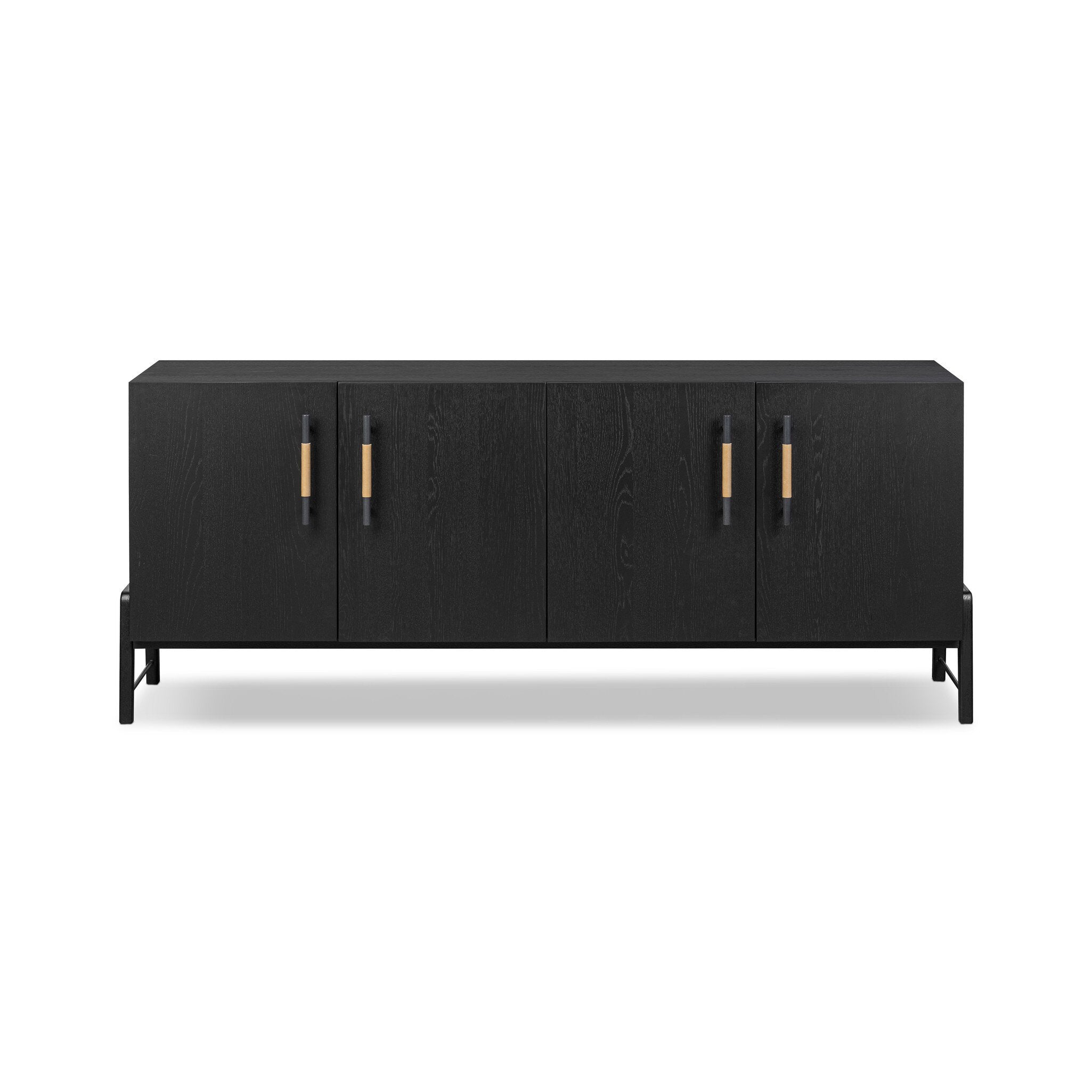 Featuring Rosedale Ebony Oak Sideboard by Four Hands at Amethyst Home. Accented with iron hardware wrapped in top-grain leather, black-finished oak veneer forms a clean silhouette with plenty of storage. Outset legs add an element of interest. Rear cutouts for cord management.Overall Dimensions: 73.25"w x 18.00"d x 30.00"hWeight : 154.32 lbsMaterials : Solid Oak, Top Grain Leather. Amethyst Home provides interior design, new construction, custom furniture, and area rugs in the San Diego metro area