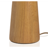 Modern minimal meets traditional. A tapered wood table lamp base is topped with a design-forward pleated shade. Amethyst Home provides interior design, new home construction design consulting, vintage area rugs, and lighting in the Boston metro area.