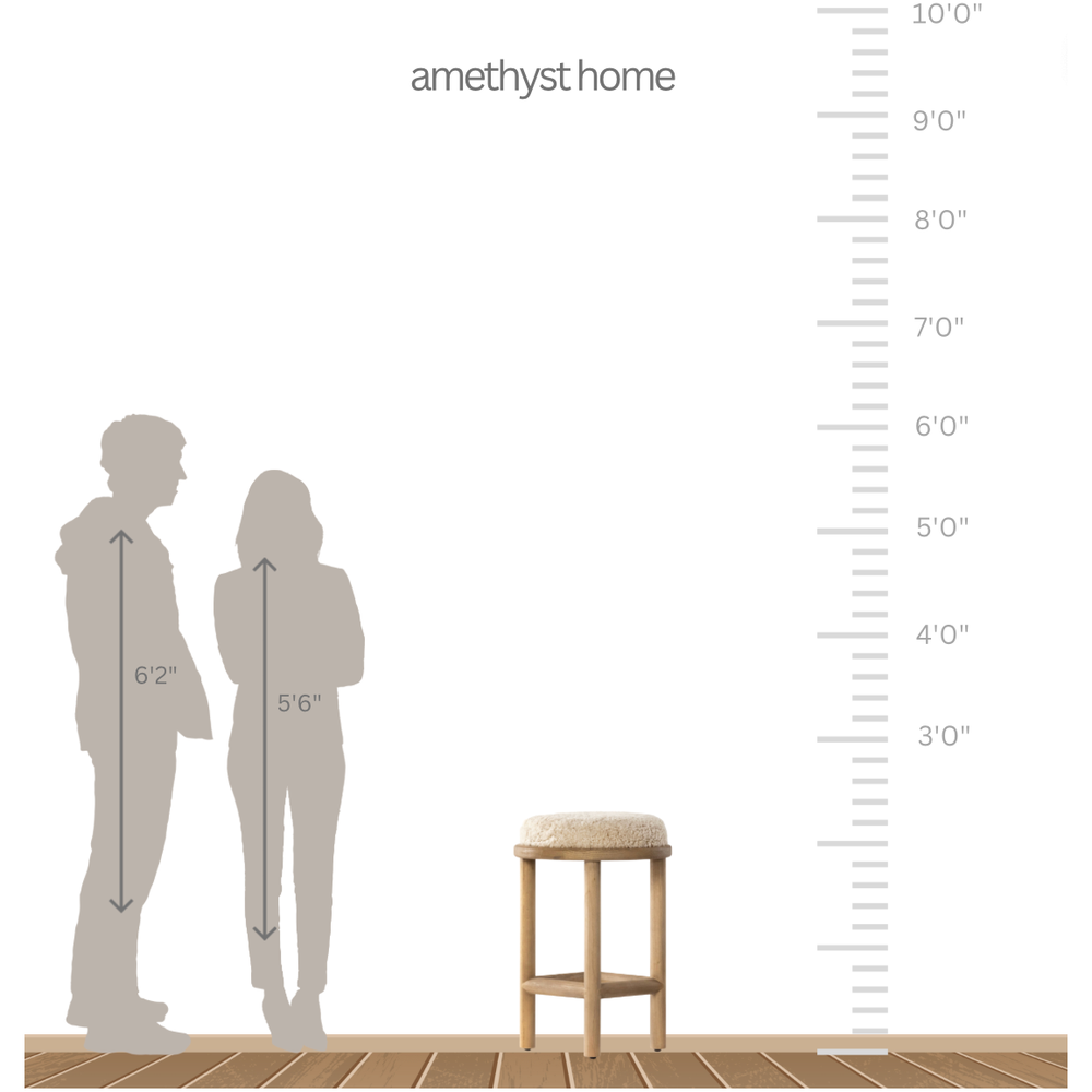 Featuring Saldino Stool by Four Hands at Amethyst Home. Bring a textural touch to the counter with the Saldino stool. Blonde-finished solid parawood supports rounded seating of soft beige shearling for comfort and style alike.
Overall Dimensions: 17"W x 17"L x 26"HColors: Blonde Nettlewood, Beige ShearlingMaterials: Solid Nettlewood, Shearling Weight: 15.21 l.  Amethyst Home provides interior design, new home construction design consulting, vintage area rugs, and lighting in the Dallas metro area.