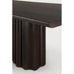 Featuring Sequence Mahogany Dark Brown Dining Table by Ethnicraft at Amethyst Home. Inspired by the rhythmic flow of repetition and variation, the Sequence dining table brings a sense of movement to your space. Solid wooden elements form a sculptural base, where alternating shapes create a balanced interplay of presence and openness. A smooth tabletop provides a quiet contrast, gro. Amethyst Home provides interior design, new construction, custom furniture, and area rugs in the Portland metro area