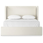 A shorter wingspan and geometric cutouts define this modern-day shelter wingback bed, designed for comfort from every angle. Upholstered in a cream fabric with subtle texture and a soft hand Amethyst Home provides interior design, new home construction design consulting, vintage area rugs, and lighting in the Monterey metro area.