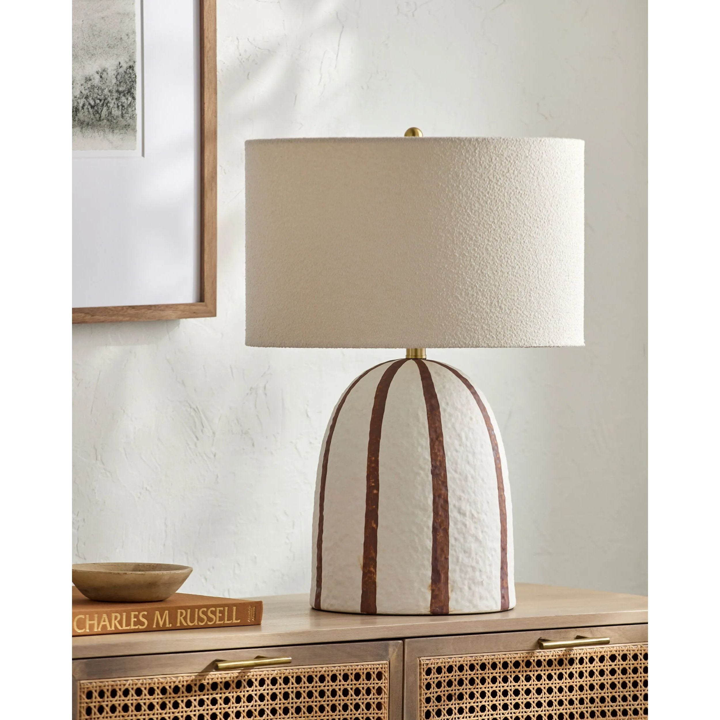 As enthusiasts of modern design at Amethyst, we love the nature inspired Hombori Accent Table Lamp. This item pairs well with other brands such as Ethnicraft and is perfect for loft homes Amethyst Home provides interior design, new home construction design consulting, vintage area rugs, and lighting in the Nashville metro area.