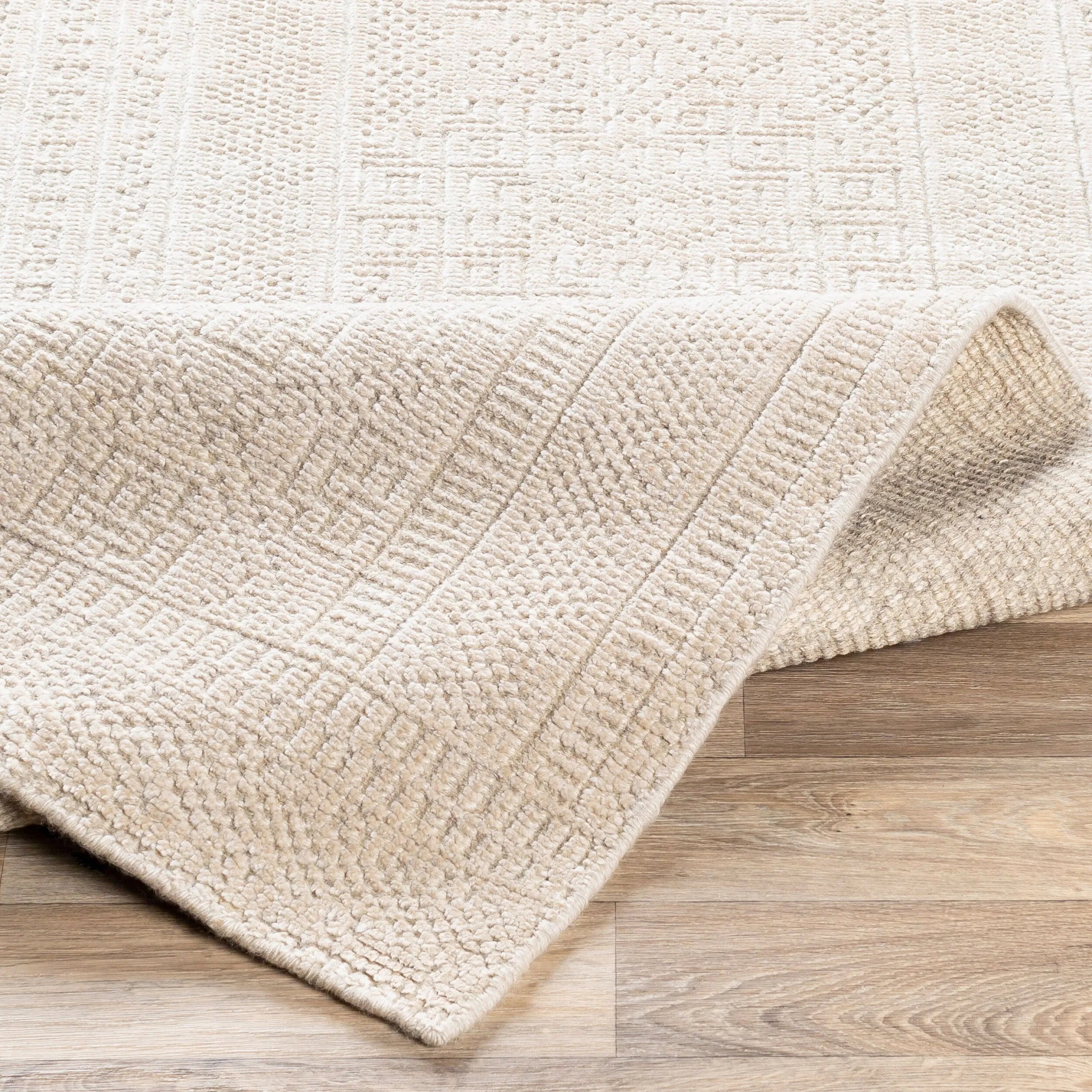 This Livorno Hand Made Rug is the perfect addition to any home decor. This piece of artistry features a timeless updated traditional style that will be sure to enhance your interior design. The rug is made of high quality wool and viscose, with no pile and hand knotted construction for maximum durability and longevity. Amethyst Home provides interior design, new home construction design consulting, vintage area rugs, and lighting in the Omaha metro area.