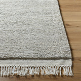 Introducing the Mabel Collection, where Country Cottage meets chic comfort. This handmade rug boasts a high pile construction, hand-woven from pure wool in the heartland of India, ensuring a plush and comfortable surface to walk on. It comes with an appealing fringe detail that adds a touch of rustic charm to any room. Amethyst Home provides interior design, new home construction design consulting, vintage area rugs, and lighting in the Laguna Beach metro area.