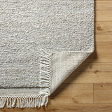 Introducing the Mabel Collection, where Country Cottage meets chic comfort. This handmade rug boasts a high pile construction, hand-woven from pure wool in the heartland of India, ensuring a plush and comfortable surface to walk on. It comes with an appealing fringe detail that adds a touch of rustic charm to any room. Amethyst Home provides interior design, new home construction design consulting, vintage area rugs, and lighting in the Nashville metro area.