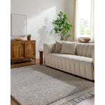 Introducing the Mabel Collection, where Country Cottage meets chic comfort. This handmade rug boasts a high pile construction, hand-woven from pure wool in the heartland of India, ensuring a plush and comfortable surface to walk on. It comes with an appealing fringe detail that adds a touch of rustic charm to any room. Amethyst Home provides interior design, new home construction design consulting, vintage area rugs, and lighting in the Park City metro area.