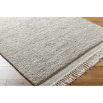 Introducing the Mabel Collection, where Country Cottage meets chic comfort. This handmade rug boasts a high pile construction, hand-woven from pure wool in the heartland of India, ensuring a plush and comfortable surface to walk on. It comes with an appealing fringe detail that adds a touch of rustic charm to any room. Amethyst Home provides interior design, new home construction design consulting, vintage area rugs, and lighting in the Tampa metro area.
