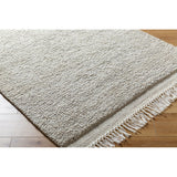 Introducing the Mabel Collection, where Country Cottage meets chic comfort. This handmade rug boasts a high pile construction, hand-woven from pure wool in the heartland of India, ensuring a plush and comfortable surface to walk on. It comes with an appealing fringe detail that adds a touch of rustic charm to any room. Amethyst Home provides interior design, new home construction design consulting, vintage area rugs, and lighting in the Tampa metro area.