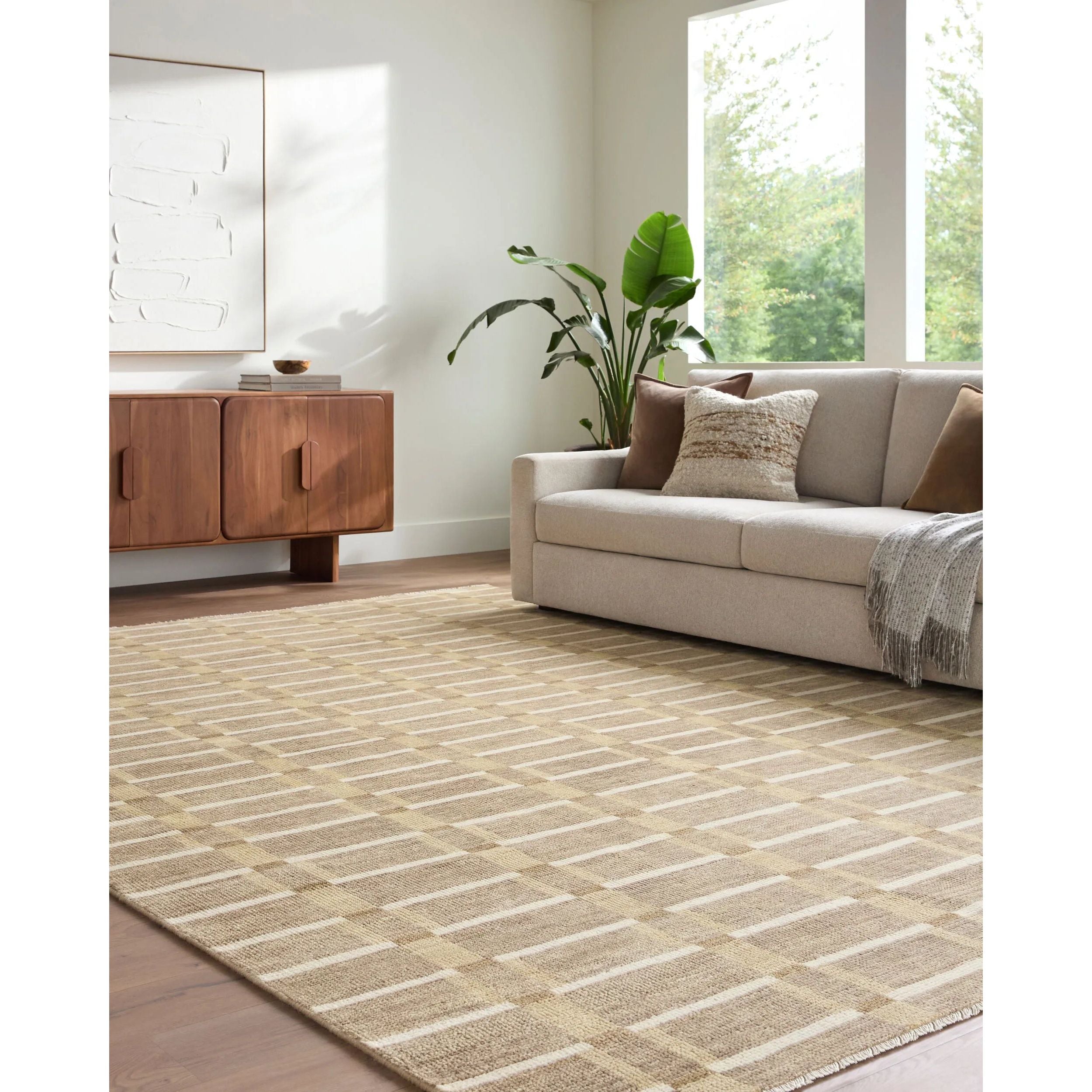 Transform your living space into a vibrant sanctuary with the Riviera handmade rug, a stunning embodiment of Bohemian Global style. This exquisite piece, hand-knotted in India, combines the plush comfort of New Zealand wool with the natural durability of cotton, creating a low-pile masterpiece that's both cozy and resilient. Amethyst Home provides interior design, new home construction design consulting, vintage area rugs, and lighting in the Houston metro area.