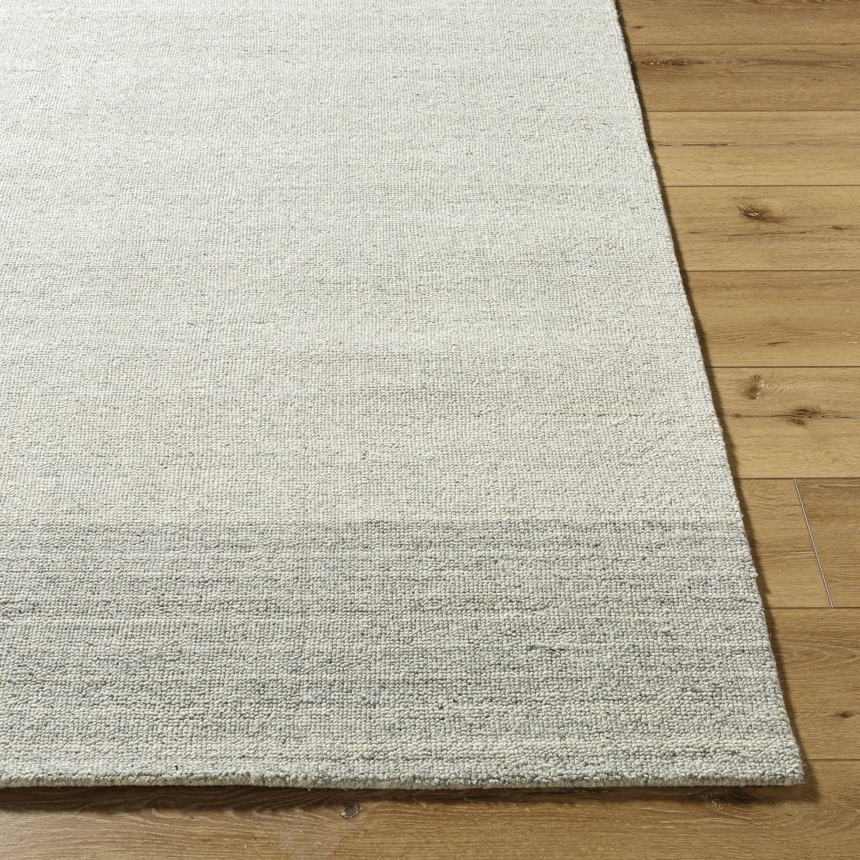 Featuring Romano Grey Rug by Surya at Amethyst Home. This high-quality Romano Rug will add warmth and style to any room. Made from durable materials and expertly crafted, this rug is designed to last. With its elegant design and soft texture, it will provide both comfort and aesthetic appeal to your living space.
100% WoolHand LoomedBacking: CanvasLow PileThick. Amethyst Home provides interior design, new home construction design consulting, vintage area rugs, and lighting in the Omaha metro area.