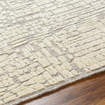 Introducing the Tunus Molly rug, hand-knotted from 100% wool and woven into an abstract, geometric pattern. Featuring taupe and ivory colors, this stylish and warm rug brings modern sophistication to any space. Amethyst Home provides interior design, new home construction design consulting, vintage area rugs, and lighting in the Tulsa metro area.