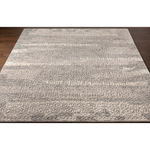 The Tunus Silver Rug features a globally inspired design made from wool. The hand-knotted rug adds wabi sabi charm to any room. Amethyst Home provides interior design, new home construction design consulting, vintage area rugs, and lighting in the Miami metro area.