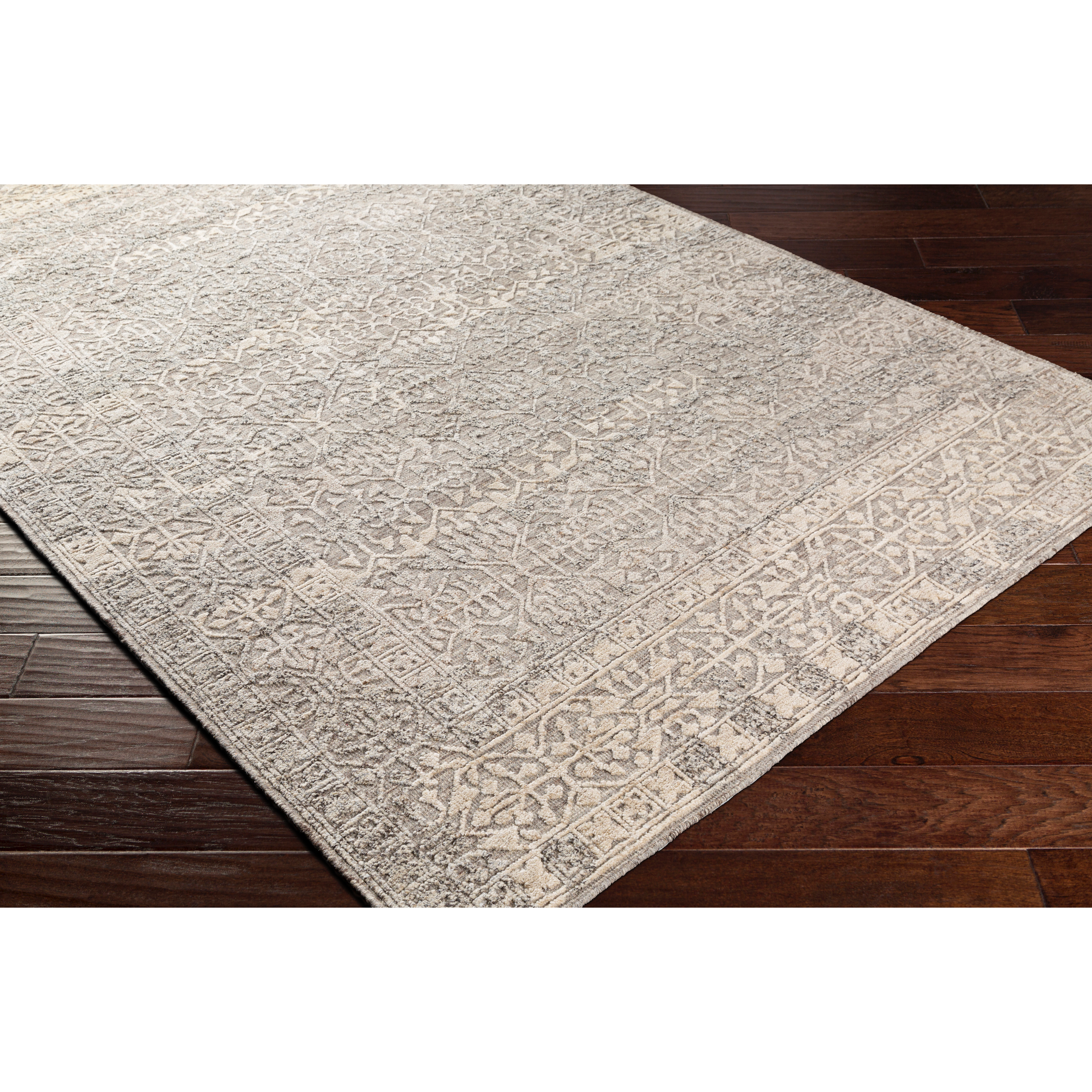 The Tunus Silver Rug features a globally inspired design made from wool. The hand-knotted rug adds wabi sabi charm to any room. Amethyst Home provides interior design, new home construction design consulting, vintage area rugs, and lighting in the Portland metro area.