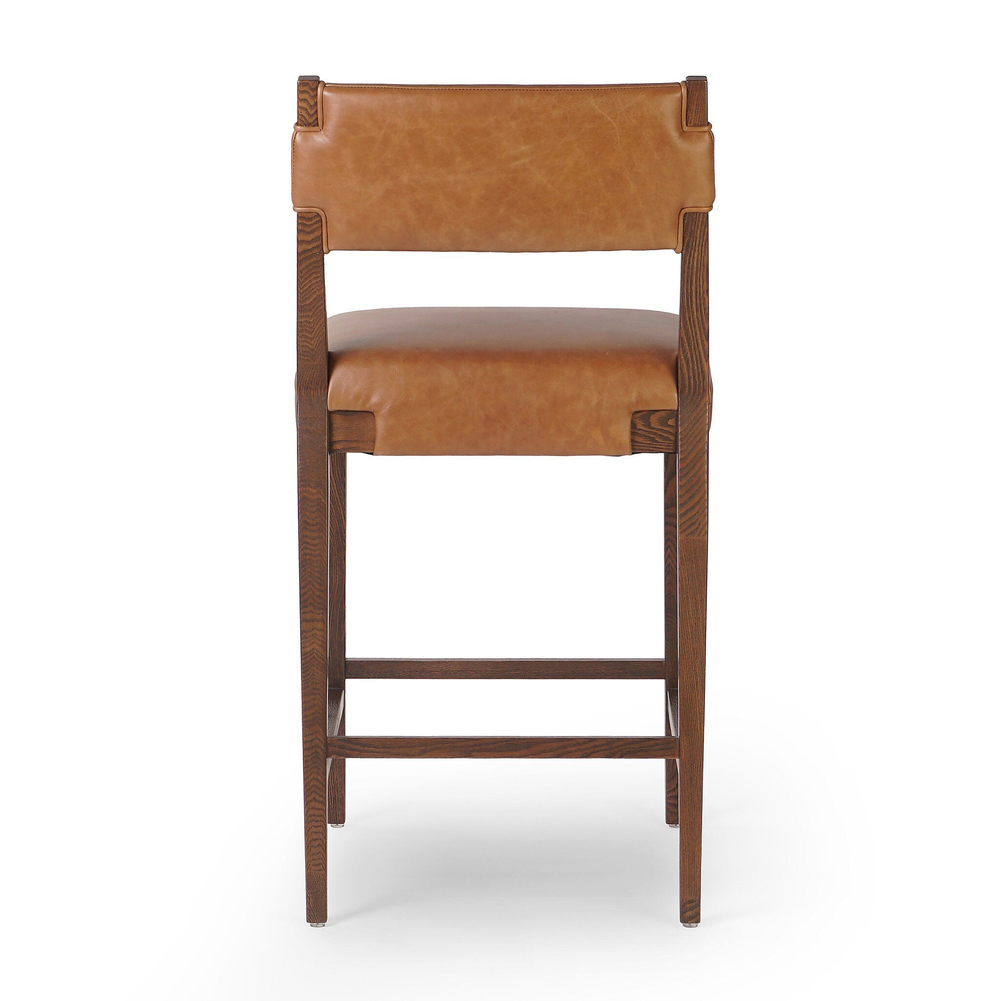 Featuring Tamari Sonoma Chestnut Bar + Counter Stool by Four Hands at Amethyst Home. A solid ash frame pairs with chestnut top-grain leather exclusive to Four Hands. Perfectly sized for the counter.BarOverall Dimensions: 19.75"w x 23.50"d x 43.75"hWeight: 20.50 lbsCounterOverall Dimensions: 19.75"w x 23.50"d x 40.25"hWeight: 18.74 lbsMaterials : Top Grain Leather, Solid Ash, 93% Polyu. Amethyst Home provides interior design, new construction, custom furniture, and area rugs in the Tampa metro area