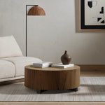 Featuring Hudson Coffee Table - Natural Yukas by Four Hands at Amethyst Home. We love how the stunning forces of nature are captured in the Hudson Natural Yukas Coffee Table. Natural yukas wood is hand-shaped into a cylindrical silhouette and placed over a bronzed iron base to complete your living room space. 
Overall Dimensions: 40"W x 40"L x 15"H
Colors:. Amethyst Home provides interior design, new home construction design consulting, vintage area rugs, and lighting in the Scottsdale metro area.