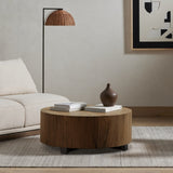 Featuring Hudson Coffee Table - Natural Yukas by Four Hands at Amethyst Home. We love how the stunning forces of nature are captured in the Hudson Natural Yukas Coffee Table. Natural yukas wood is hand-shaped into a cylindrical silhouette and placed over a bronzed iron base to complete your living room space. 
Overall Dimensions: 40"W x 40"L x 15"H
Colors:. Amethyst Home provides interior design, new home construction design consulting, vintage area rugs, and lighting in the Scottsdale metro area.
