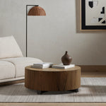 Featuring Hudson Coffee Table - Natural Yukas by Four Hands at Amethyst Home. We love how the stunning forces of nature are captured in the Hudson Natural Yukas Coffee Table. Natural yukas wood is hand-shaped into a cylindrical silhouette and placed over a bronzed iron base to complete your living room space. 
Overall Dimensions: 40"W x 40"L x 15"H
Colors:. Amethyst Home provides interior design, new home construction design consulting, vintage area rugs, and lighting in the Scottsdale metro area.