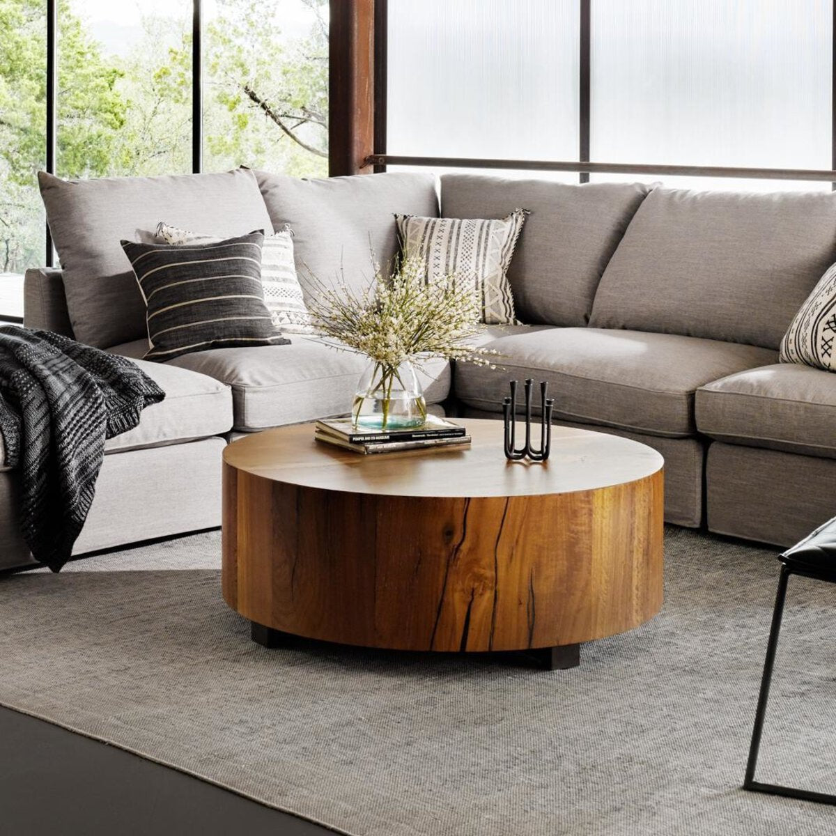 Featuring Hudson Coffee Table - Natural Yukas by Four Hands at Amethyst Home. We love how the stunning forces of nature are captured in the Hudson Natural Yukas Coffee Table. Natural yukas wood is hand-shaped into a cylindrical silhouette and placed over a bronzed iron base to complete your living room space. 
Overall Dimensions: 40"W x 40"L x 15"H
Colors: Blac. Amethyst Home provides interior design, new home construction design consulting, vintage area rugs, and lighting in the Miami metro area.