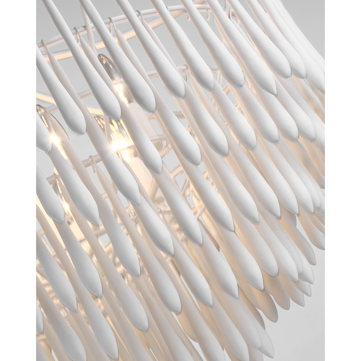 Featuring Vacarro Medium Chandelier Plaster White by Visual Comfort at Amethyst Home. The Vacarro by Julie Neill transforms classic basket chandeliers into a new and unique design statement. Hanging from the basket frame are sculptural, elongated plaster teardrops that create an unexpected texture while light emanates from within the basket. Available in all white or with a meta. Amethyst Home provides interior design, new construction, custom furniture, and area rugs in the Kansas City metro area