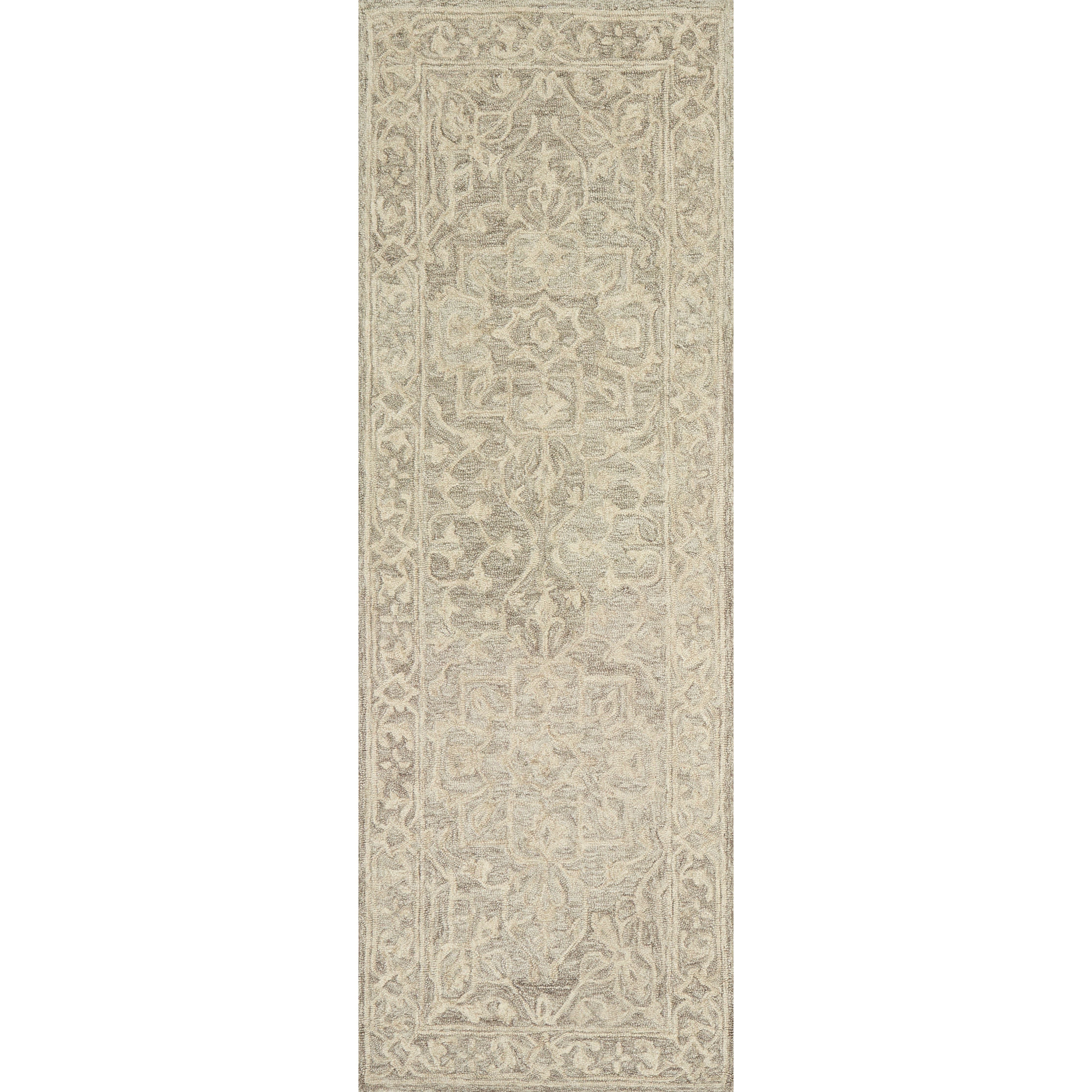 Finely hooked of 100% wool, the carefully crafted Loloi Lyle Stone Area Rug, or LK-02, is acclaimed for its soft texture and muted color range. Each piece showcases space-dyed wool, which lends a subtle gradation of hues throughout the traditional motifs. 