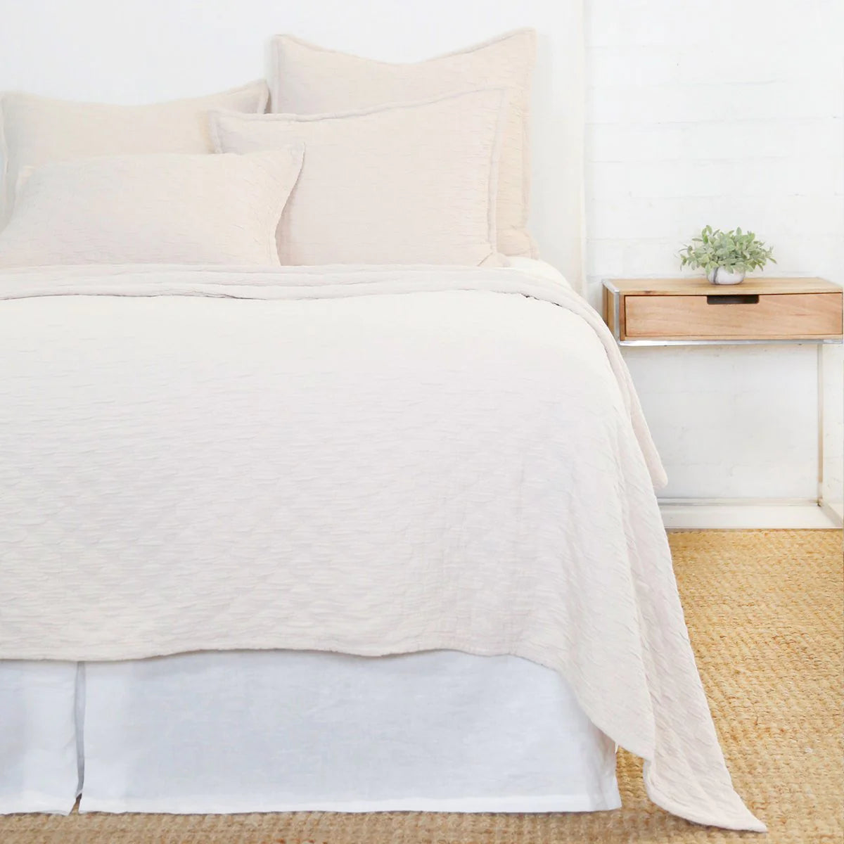 Crafted in Portugal, the Ojai matelasse by Pom Pom at Home is light and casual, bringing comfort with its subtle diamond pattern. The coziest bedding to climb into after a long day.  King lounger 100% cotton. Amethyst Home provides interior design, new home construction design consulting, vintage area rugs, and lighting in the Des Moines metro area.
