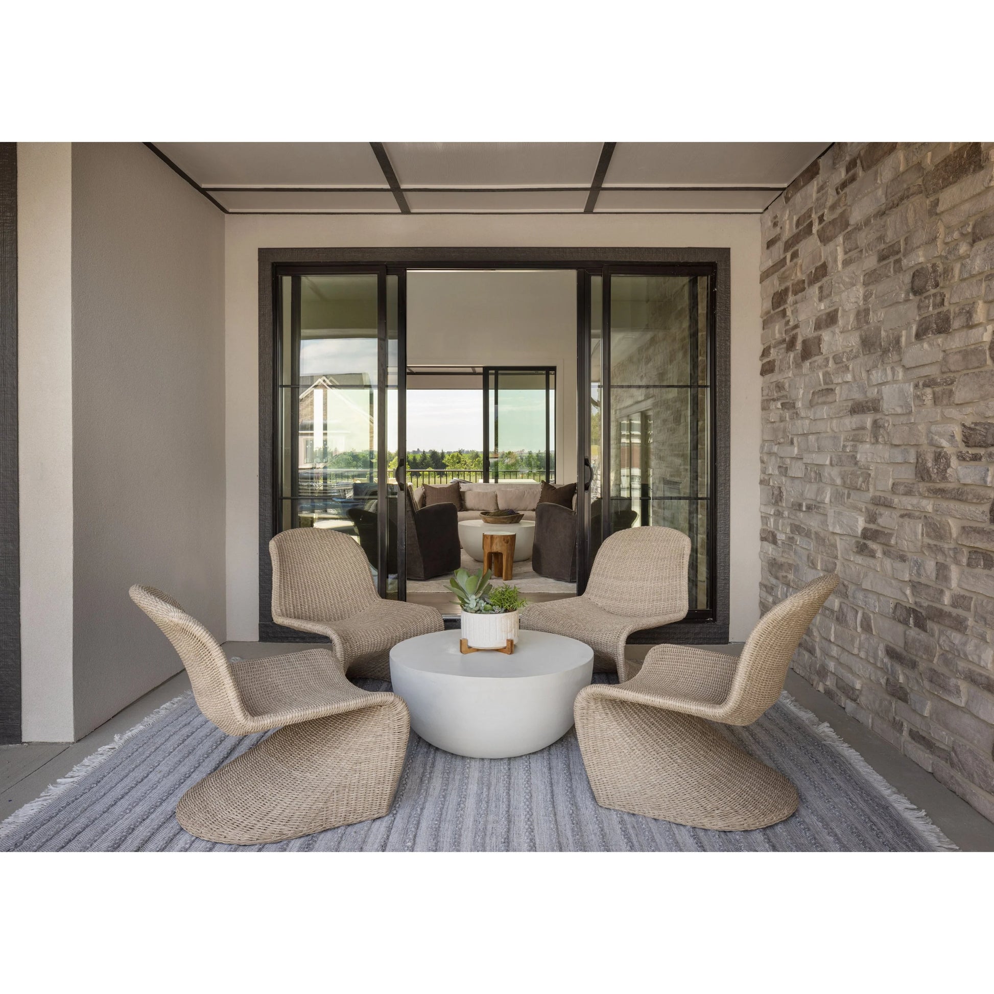 Drum Iron Coffee Table and Portia Outdoor Chair