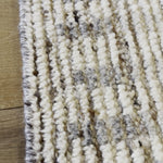 Subtle linear textures and natural colorways define the irresistible quality of the Seora collection. The Camino area rug features a series of perpendicular, striped lines for an intriguing dose of modern appeal. The textural, wool pile contains no dye, reflecting the natural colors of the sheep, for a rich and grounding palette of tan, cream, and flecks of brown and gray. Amethyst Home provides interior design, new construction, custom furniture, and area rugs in the Kansas City metro area.