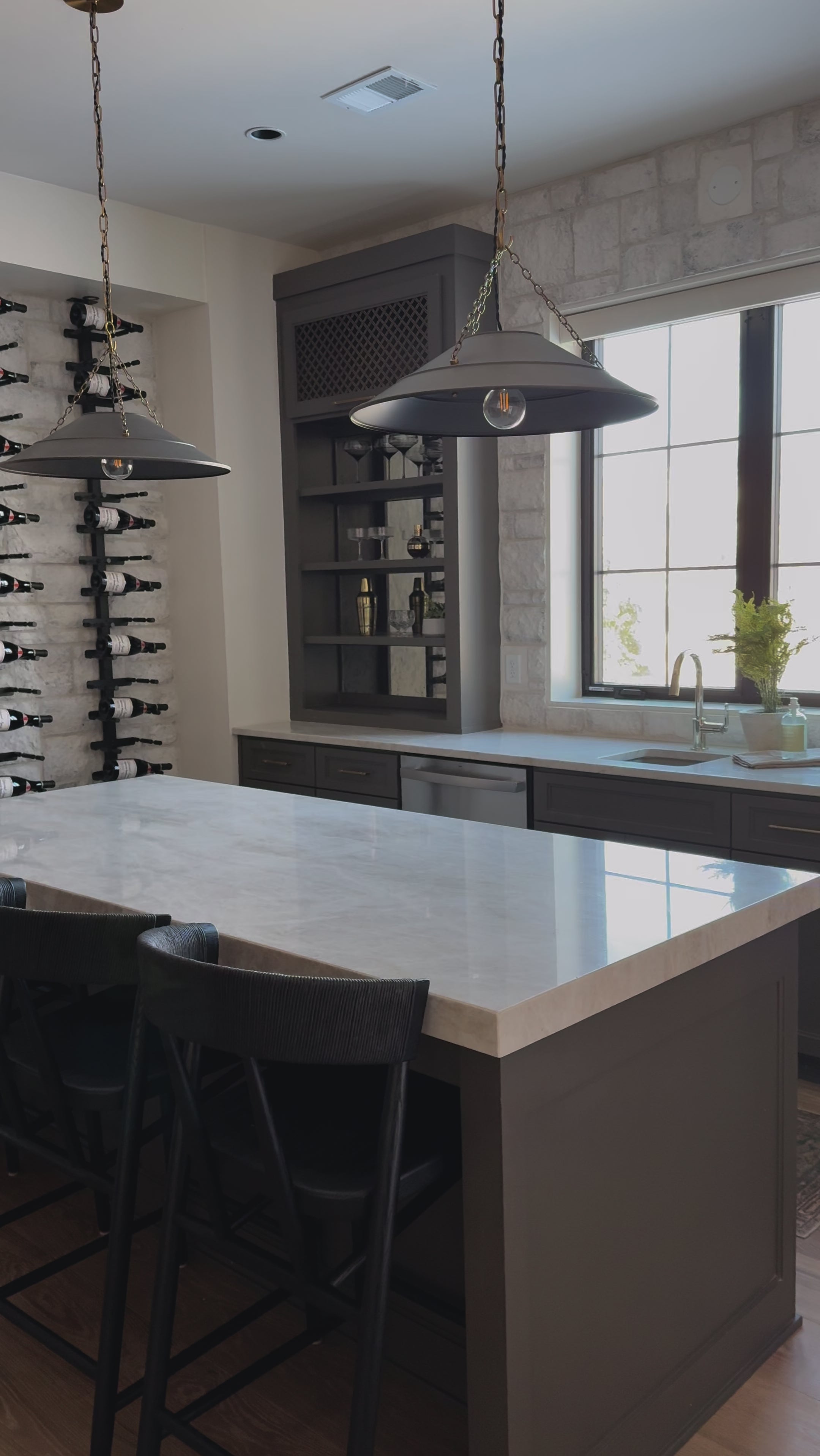 A solid oak counter stool defined by tapered legs and framing gives an updated look to the classic whistler chair. Finished with a paper rush wrapped detail on the back.BarOverall Dimensions: 19.25"w x 22.25"d x 42.75"hWeight: 23.70 lbsCounterOverall Dimensions: 19.50"w x 22.25"d x 38.75"hWeight: 21.61 lbsMaterials : Rush, Solid Oak Amethyst Home provides interior design, new home construction design consulting, vintage area rugs, and lighting in the Nashville metro area.