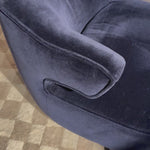 The continuous form of this swivel chair creates a sleek look that elevates everyday seating. Upholstered in navy wool blend, its sleek design is complemented by a 360-degree swivel and pedestal base of solid parawood for a mixed media moment.Overall Dimensions: 29.00"w x 33.75"d x 27.25"h Amethyst Home provides interior design, new home construction design consulting, vintage area rugs, and lighting in the Alpharetta metro area.