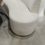 Featuring a dramatically shaped and tightly tailored look, the Sanda dining banquette in an ivory high-performance fabric places a sensible twist on an elegant dining bench. Amethyst Home provides interior design, new home construction design consulting, vintage area rugs, and lighting in the Park City metro area.