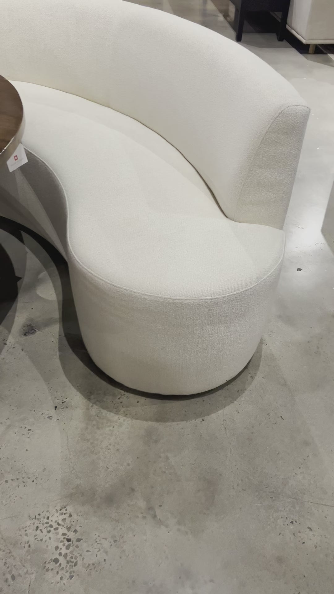 Featuring a dramatically shaped and tightly tailored look, the Sanda dining banquette in an ivory high-performance fabric places a sensible twist on an elegant dining bench. Amethyst Home provides interior design, new home construction design consulting, vintage area rugs, and lighting in the Park City metro area.