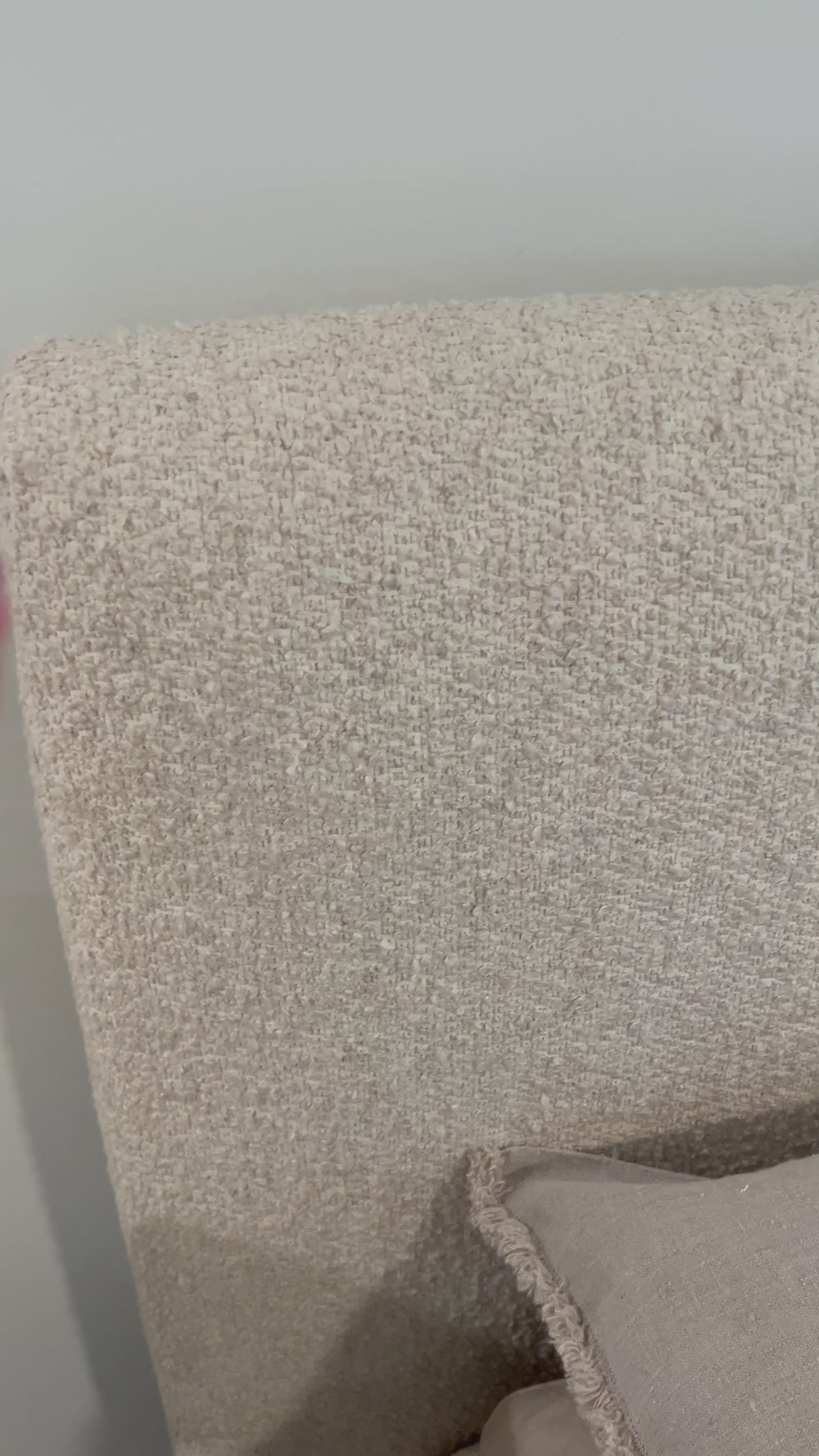 Modern, clean shaping meets inflated comfort with this padded, upholstered bed frame in a textural boucle-like pattern.  Text(251) 257-7986 for quick product details.Overall Dimensions: 92.25"W x 89.25"L x 48"H Amethyst Home provides interior design, new home construction design consulting, vintage area rugs, and lighting in the Seattle metro area.