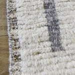 Subtle linear textures and natural colorways define the irresistible quality of the Seora collection. The Foxlin area rug features a border and dash design for an intriguing dose of modern appeal. The textural, wool pile contains no dye, reflecting the natural colors of the sheep, for a rich and grounding palette of cream, gray, and brown. Amethyst Home provides interior design services, furniture, rugs, and lighting in the Kansas City metro area.