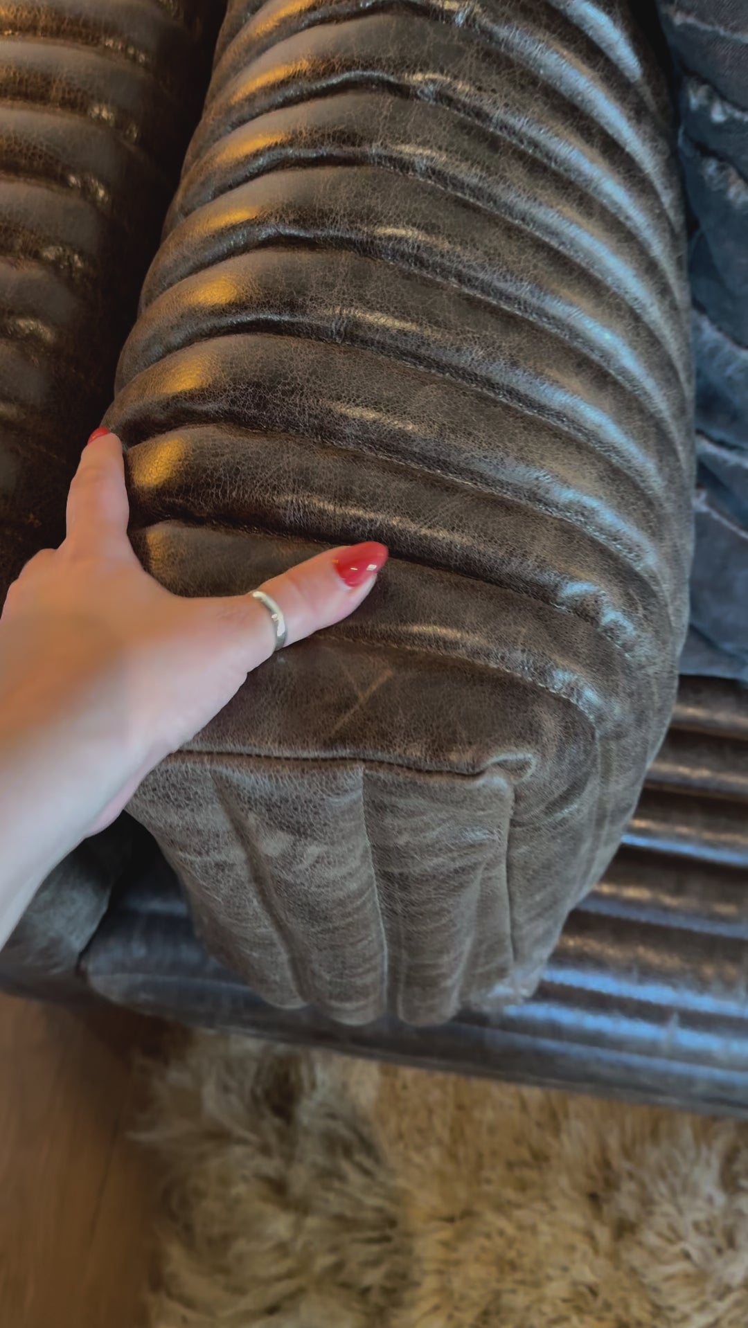 The Clemence Sofa features a minimalist design with clean, low-profile lines, complemented by plush cushions and luxurious throw pillows. Amethyst Home provides interior design, new home construction design consulting, vintage area rugs, and lighting in the Los Angeles metro area.