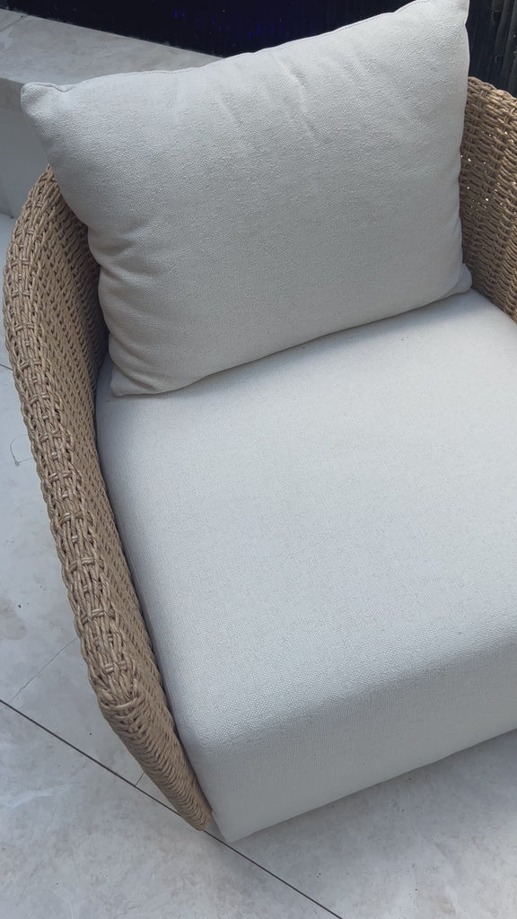 Sustainably made with zero waste, luxurious Italian upholstery places a new and unique spin on indoor/outdoor seating, offering soft, durable fabric that's highly resistant to sun, stains, mold and abrasion. Shell framing of faux hyacinth weaves for extra texture atop a 360-degree swivel. Cover or store indoors during inclement weather and when not in use. Amethyst Home provides interior design, new home construction design consulting, vintage area rugs, and lighting in the Laguna Beach metro area.