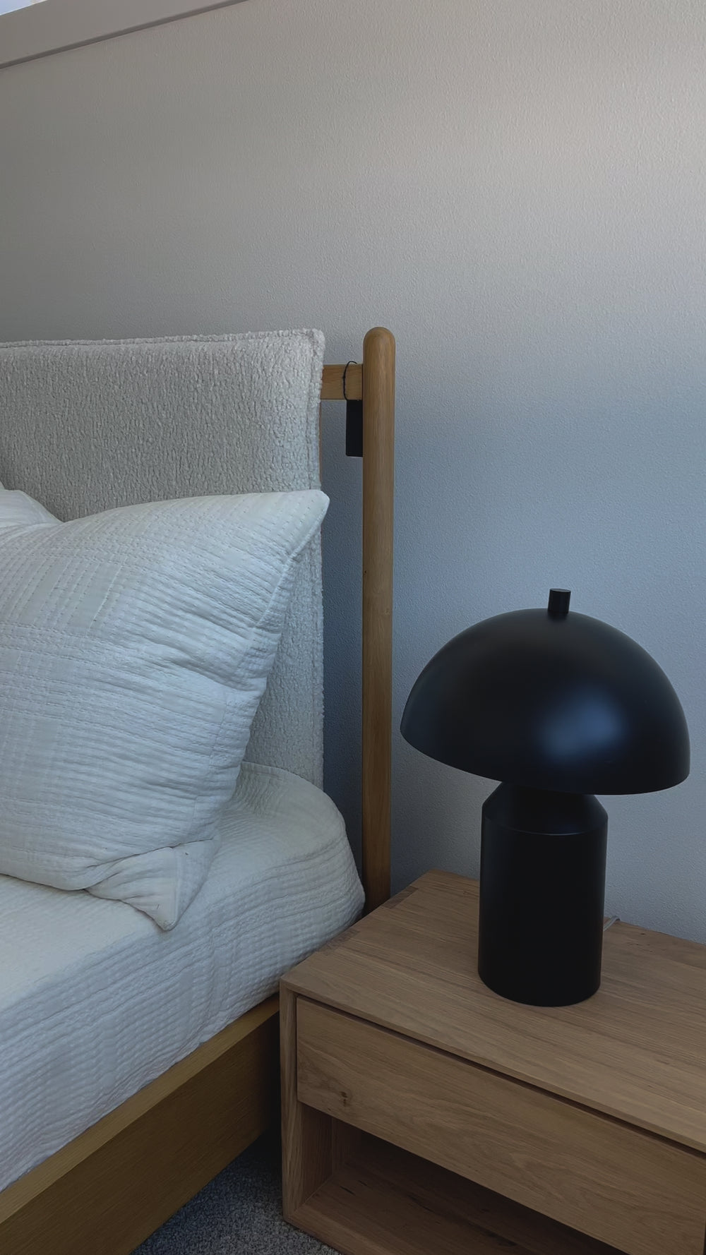 Bring a cozy hygge vibe to the bedroom with this textured Bowen Bed. Framed by light-finished solid oak, a sling-style bed features faux shearling head and foot boards -- sure to elevate any bedroom. Amethyst Home provides interior design, new home construction design consulting, vintage area rugs, and lighting in the Laguna Beach metro area.