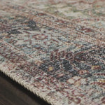The Loren Brick/Multi area rug from Loloi captures the spirit of a one-of-a-kind vintage or antique area rug. You will love this rug because the rug is:   Perfect for families with kids and pets Very easy to clean and maintain Comes in big area rug sizes and as cute kitchen and hallway runners Looks gorgeous with the intricate pattern and patina Warms up any room with tones of blue, red, and ivory Power Loomed 100% Polyester LQ-14 Brick/Multi Colors: Blue, Red, Ivory