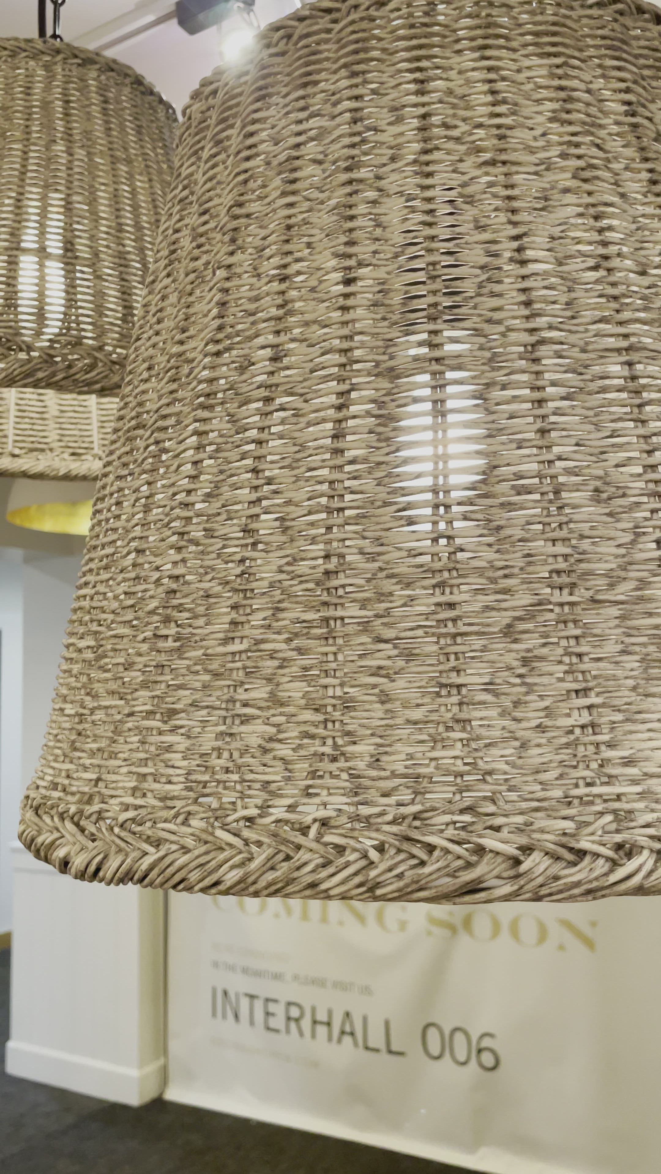 The Augustine Augustine Outdoor Pendant - Large provides a relaxed, coastal or southern style with its white-washed woven wicker basket pendant and blackened metal detailing. Add a little rustic charm to your outdoor living space with this organic luminary.  Dimensions: 22.5"h x 19.5"d x 19.5"d