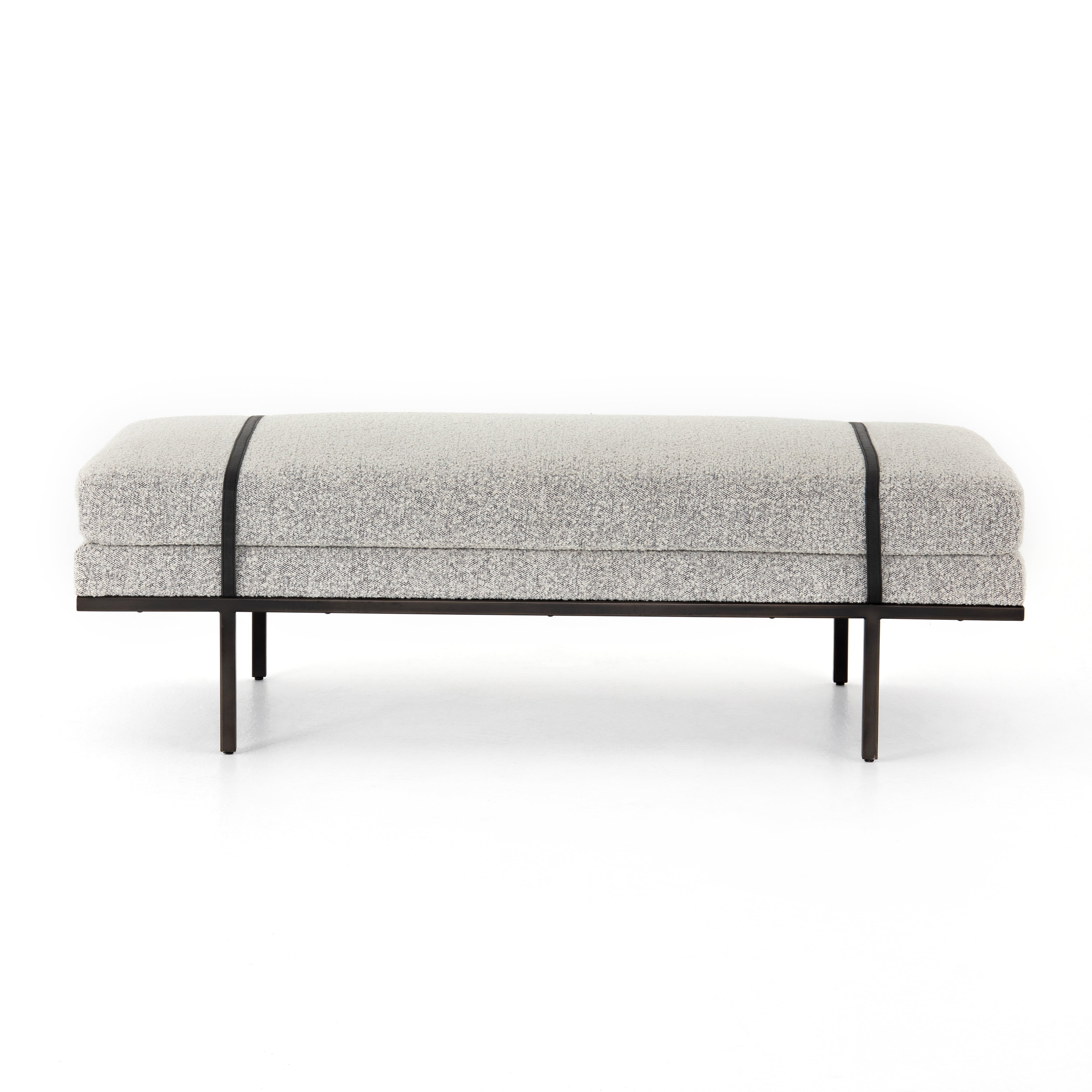 Make a chic statement with the Harris Knoll Domino Accent Bench. Decorative straps of black top-grain leather take chaise-style bench seating to the next level. Airy, elongated legs lend a look of lightness for balance.  Available late September 2020!  Overall Dimensions: 60"w x 26"d x 19.25"h Materials: Solid Parawood