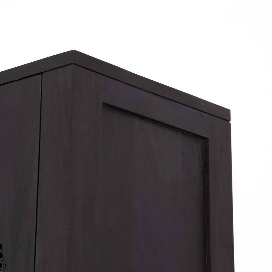 We love the textural cane door panels of the Tilda Black Wash Mango Cabinet. Store your favorite china set, books, or other household goods while also brining a beautiful, monochromatic vibe to the room  Size: 39"w x 18"d x 86"h Materials: Solid Mango, Iron, Cane