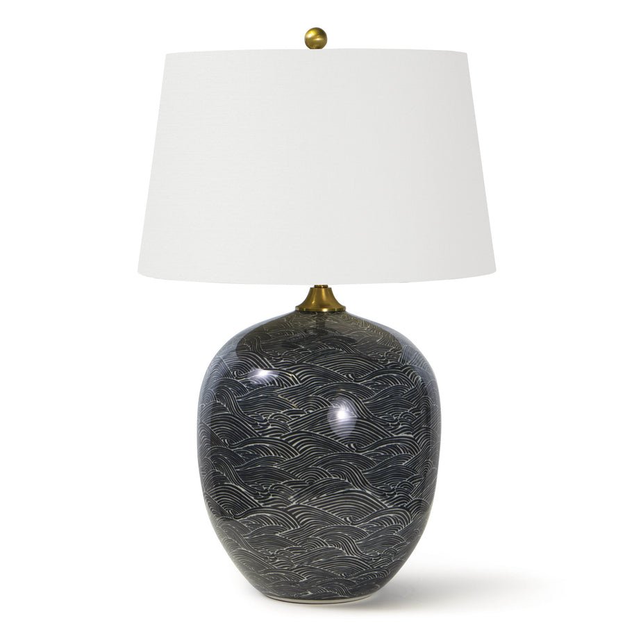 This Harbor Ceramic Table Lamp by Regina Andrew features a specialized glazing technique that highlights the gorgeous pattern in shades of black or blue. The natural linen shade brings a warm, sophisticated look to any living room, bedroom, or other area needing.  Overall Dimension: 18"w x 18"d x 29"h 