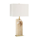 Every Selina Alabaster Table Lamp is cut uniquely for you from a raw slab of alabaster. Put this in your living room or bedroom and create a natural, earthy vibe  Size: 13"w x 7"d x 25"h Material: Alabaster 