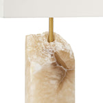 Every Selina Alabaster Table Lamp is cut uniquely for you from a raw slab of alabaster. Put this in your living room or bedroom and create a natural, earthy vibe  Size: 13"w x 7"d x 25"h Material: Alabaster 